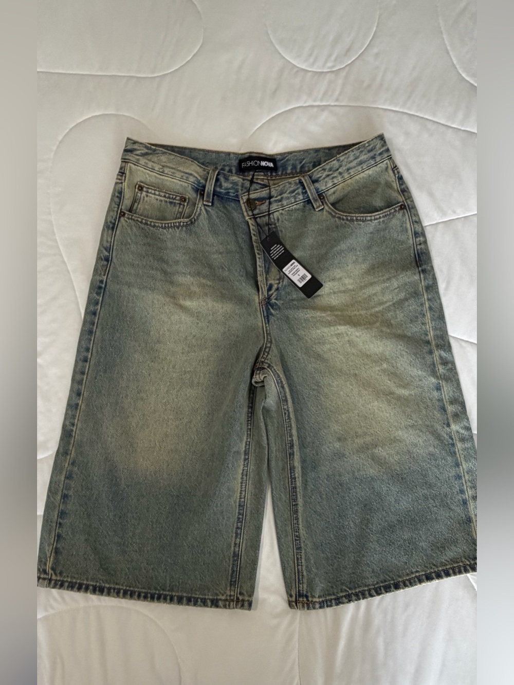 Fashion Nova woman Faded Blue-Green Denim Shorts